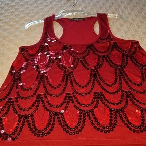 Sequined sleeveless top.